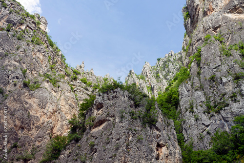 Stone structures and cliffs on top of the hill. view from the foothills. Real photo. Adobe RGB color profile.