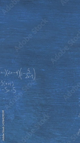 Animation of layers of mathematical formulae and equations over blue chalkboard