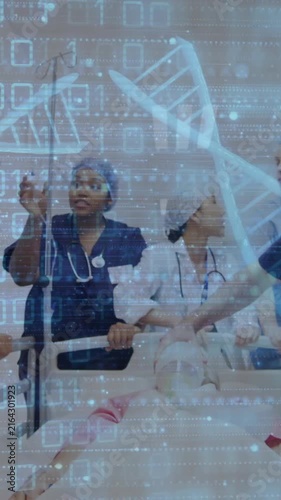 Animation of data processing and dna strands over diverse doctors working in hospital