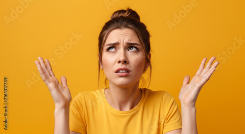 Beautiful woman shrugging shoulders unsure yellow which is perfect for corporate success presentation and advertising
