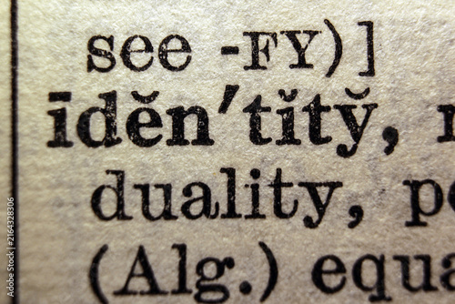 Word identity printed on dictionary page, macro close up