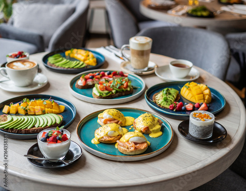Healthy Breakfast with Avocado Eggs Fruit and Fresh Salads