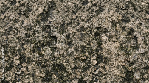 Detailed macro view of rough weathered stone surface texture