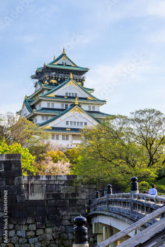 Osaka Castle, surrounded by moats, bridges and walls, is a 16th century masterpiece. Its intricate architecture, green roofs, and golden details showcase Edo period style