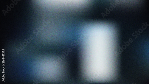 Принти на полотні Abstract blurred dark blue and grey background with soft light effects and grain