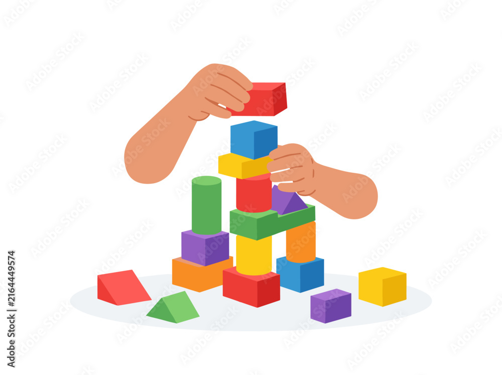 Fototapeta premium Child's hands building a colorful tower with blocks