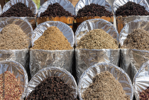Traditional oriental spices and dried herbs in foil sacks at Old Market, Sharm El Sheikh, Egypt