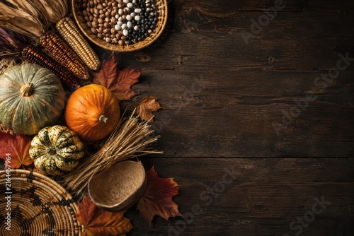 Autumn Harvest Still Life with Corn Beans Squash and Rustic Copy Space