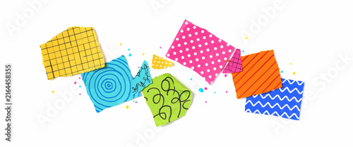Collection of vibrant torn paper fragments with unique patterns and ink splashes scattered on a white background design.