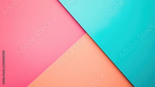Abstract geometric background with vibrant pink, peach and turquoise paper layers.