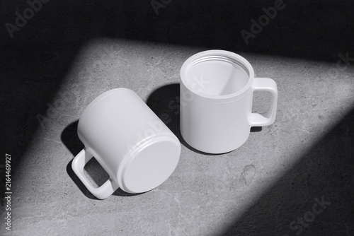 Tilted white mugs pair for mockup template