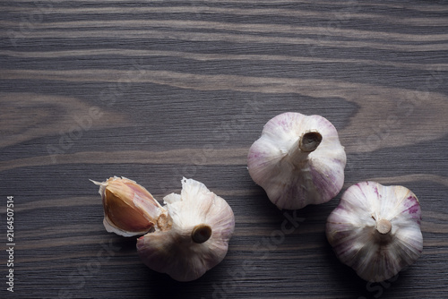 Garlic on wooden table top view