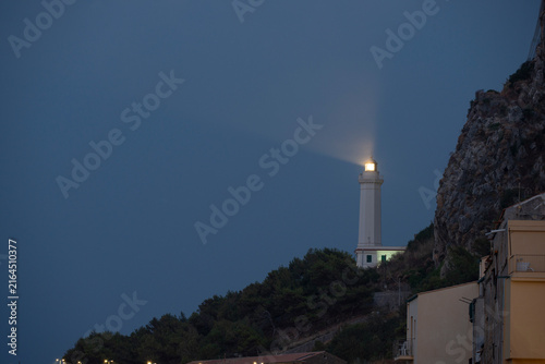 Photography lighthoude in yhe nighy, italy