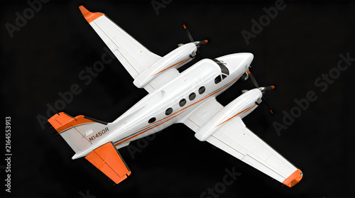 Twin engine turboprop airplane model viewed from above on black background