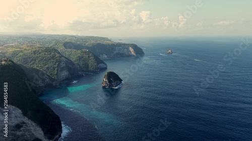 Aerial Reveal of T-Rex Cliff and Turquoise Coastline of Nusa Penida, Indonesia.