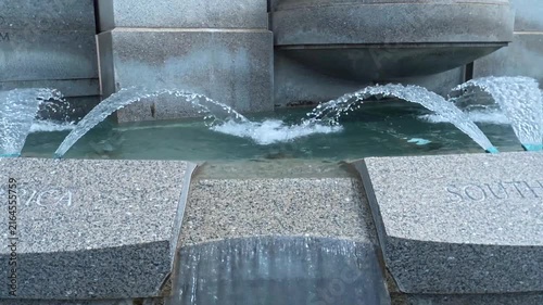 Travel and Landmarks: Close Up View of Water Jets in Rainbow Pool Fountain at National World War II Memorial in Washington DC