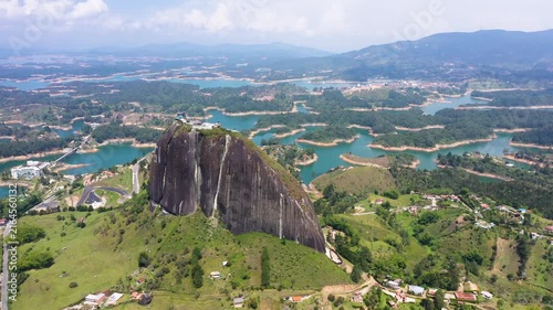 Aerial View of the Piedra del Penol Monolith in Guatapé, Colombia: A Stunning Landscape of a Massive Rock Formation Surrounded by the Intricate Labyrinth of the Embalse del Penol Reservoir