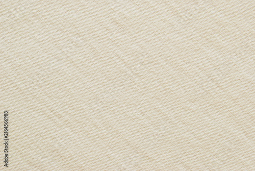 Obraz na plátně Cream knitted fabric texture with fine purl face as background