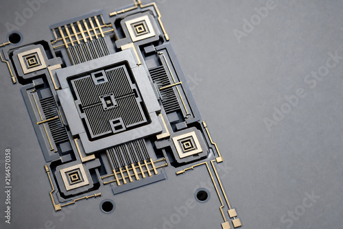 Obraz na płótnie Microscopic MEMS sensor structure in extreme macro illustrating miniaturization and precision microengineering technology