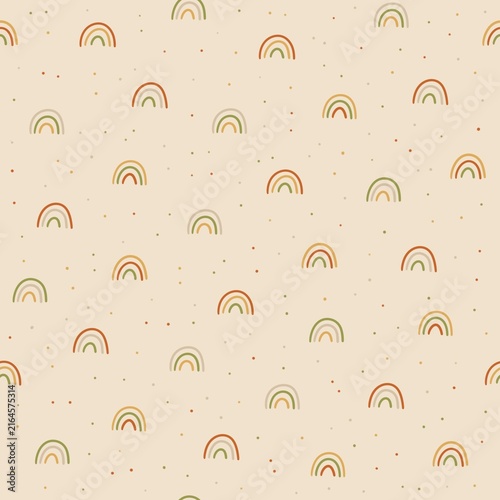 Seamless autumn rainbow pattern with hand drawn arches in warm orange, mustard, olive and beige colors with scattered dots on a soft cream background. Cozy boho design for kids textiles, nursery decor