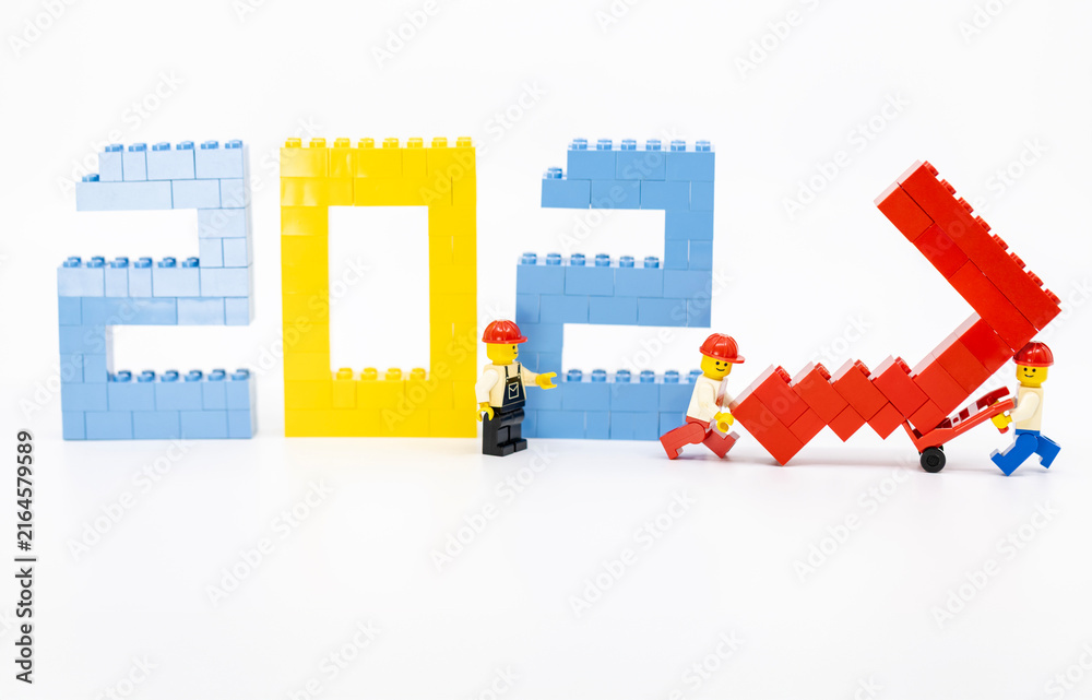 Fototapeta premium Hong Kong, August 20, 2026: A worker carries the final digit seven, symbolizing the start of 2027 and a new era.