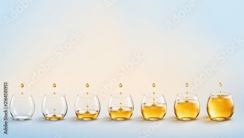 Small Steps Every Day With Accumulating Water Drops Sequence of Water Droplets into Glasses of Whiskey on Table