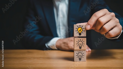 Businessman selecting a bright idea among several options, symbolizing innovation, problem-solving, and strategic thinking in business development and success