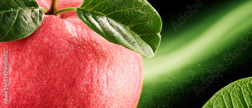 Fresh Ripe Red Guava with Green Leaves Close-Up on Dark Background