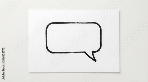 Hand drawn speech bubble illustration on white paper with a simple black outline for communication and messaging concepts