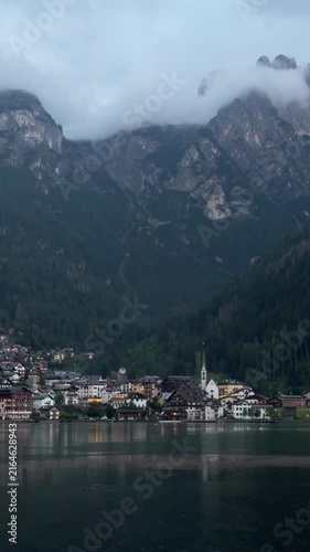 Alleghe village on Lago di Alleghe shore, Monte Civetta, Dolomites, Italy