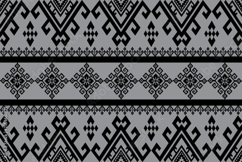  This image shows a traditional Thai fabric with an intricate geometric pattern. 