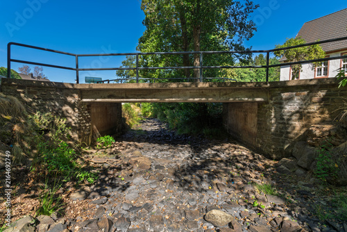 Dried up stream bed during summer drought in Germany