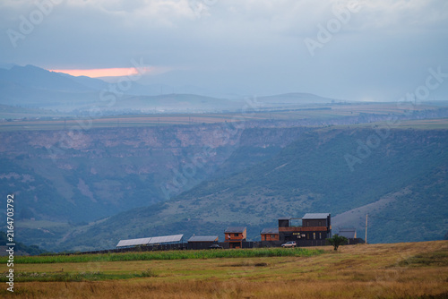 Fabulous sunset landmark with guest house and mountains, Armenia