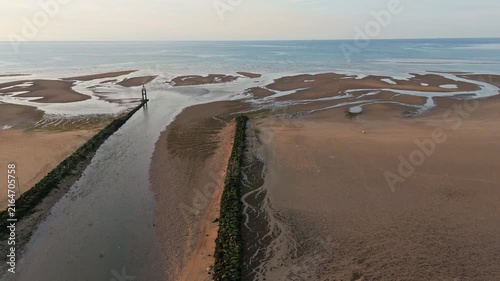 Aerial view of the Courseulles sur mer pier next to the mouth of the Seulles river