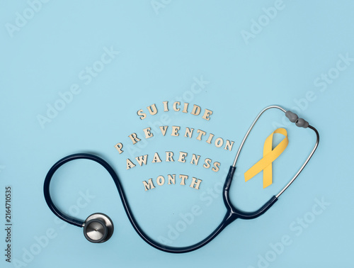 Quadro su tela World Suicide Prevention Month healthcare awareness concept with yellow ribbon,