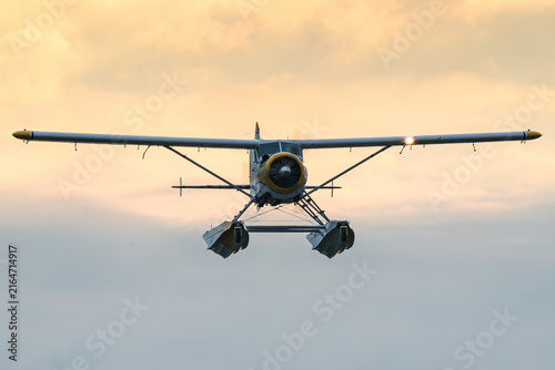 A de Havilland Canada DHC-2 Beaver amphibious floatplane during a beautiful sunset. 