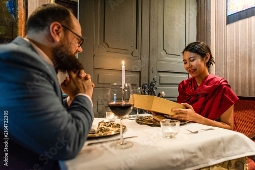 Принти на полотні Romantic dinner with gift exchange.