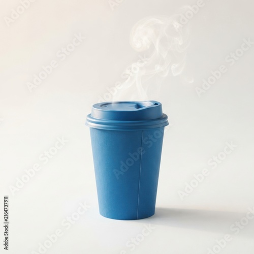 A steaming blue reusable coffee cup isolated on a plain white background for your morning beverage needs
