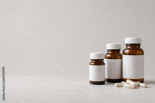 Three Bottles of Medicine and A Bottle of Pills with Visible and Natur