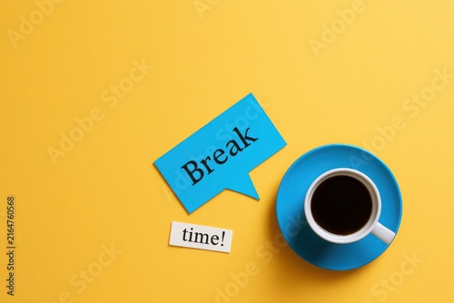 Coffee Break Moment: A bright blue cup of coffee rests on a saucer against a vibrant yellow background, next to a blue speech bubble that says Break and a small tag that says time!.