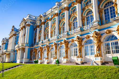 Grand palace gleams under bright blue sky