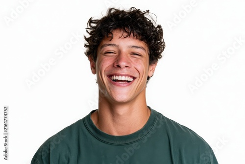 Portrait of a cheerful young man on a white studio backdrop