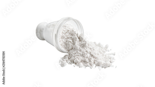 White protein powder spilling from clear plastic container isolated against plain white background with container lying side clean white surface spilling out onto translucent plastic