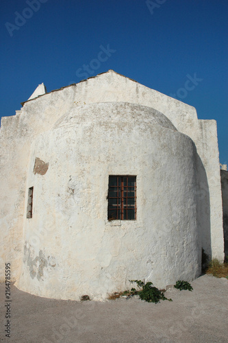 Quadro su tela The traditional weathered semicircular apse wall of the historic Church of Panag