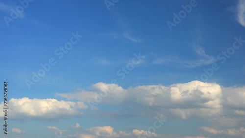 Timelapse of white clouds in blue sky