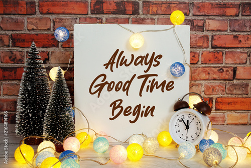 Fotografie Always Good Time Begin Display with LED Lights Cotton Balls and Mini Trees