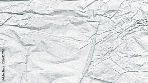 Cuadro en lienzo Aged white wrinkled paper texture with diagonal creases and complex fold patterns across entire frame suitable for artistic backdrops and modern aesthetic designs with subtle shadow details