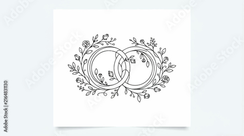 Interlocking floral wedding rings framed by a delicate wreath symbolizing unity and love.