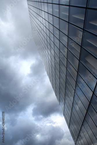 Modern architecture and stormy sky on background