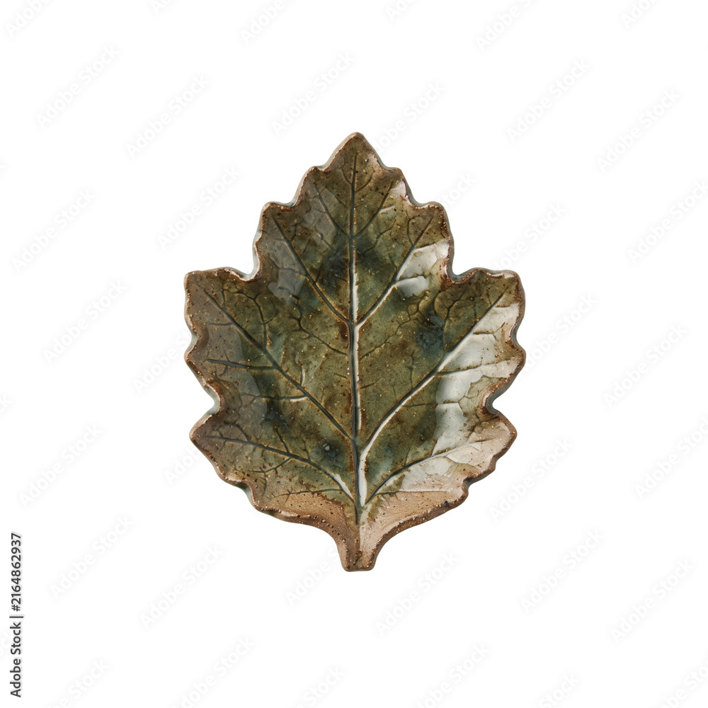 Fototapeta premium Green and brown ceramic leaf shaped dish or plate